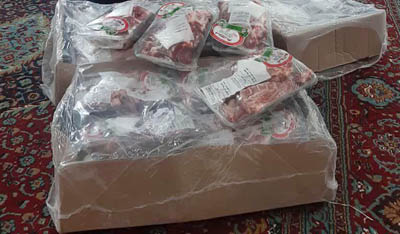 پخش بسته هاي گوشت نذري در روستاي وسطي کلا آمل