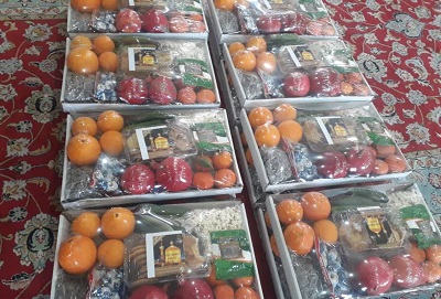 اهداي بسته هاي يلدايي به خانواده‌هاي محروم به همت کانون امام علي محمودآباد